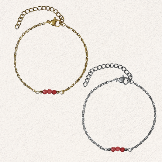 armband met kleine donkerroze steentjes