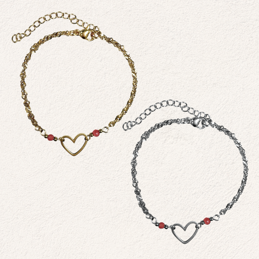 armbandje met open hart en roze steentjes