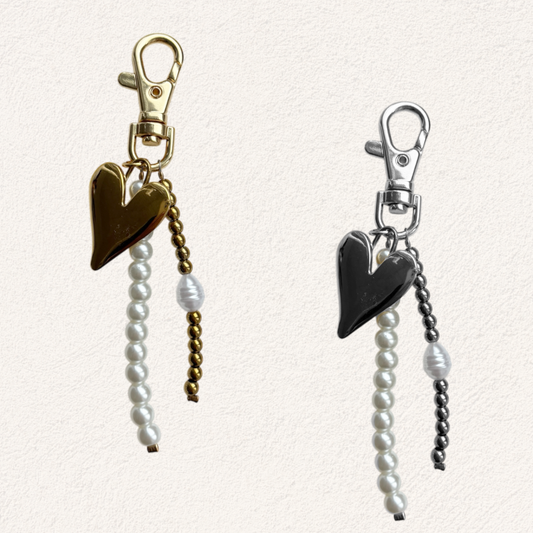 parel en hartjes tassen en sluitelhanger
